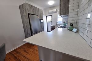 Kitchen at Adamstown Short Stay Apartments.