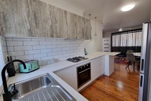 Kitchen at Adamstown Short Stay Apartments.